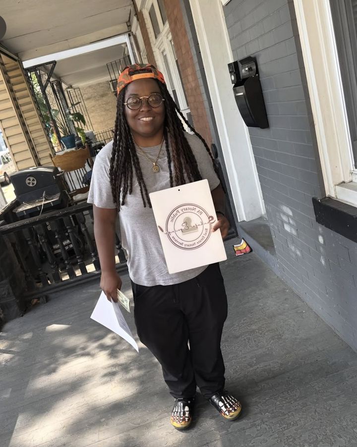 Khalia Luff on location for a mobile notary signing on a Philadelphia rowhome porch