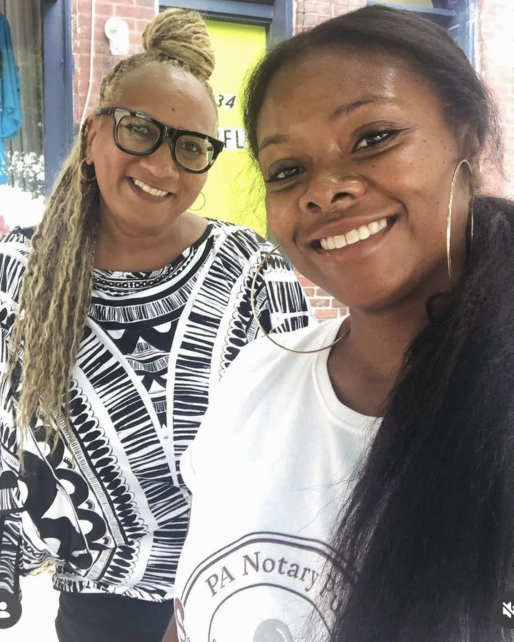 Khalia Luff of Sankofa Signings out in a Philadelphia neighborhood between signings
