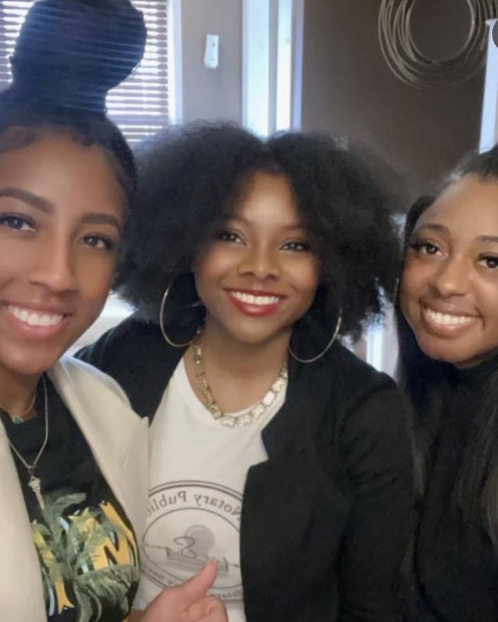 Khalia Luff of Sankofa Signings, Philadelphia mobile notary, with friends and clients